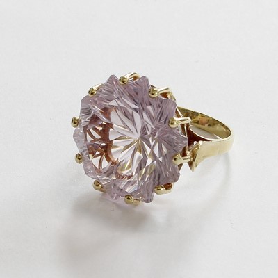 Lot 243 - An Amethyst Ring, the fancy cut amethyst in a...