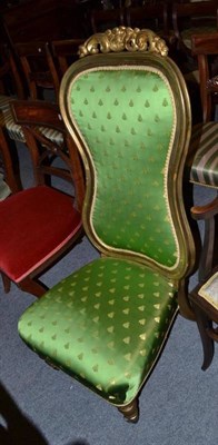 Lot 514 - A gilt painted nursing chair with green ";bee"; upholstery