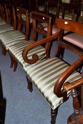 Lot 516 - A set of six mahogany dining chairs including two carvers with carved back rails