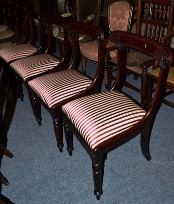 Lot 517 - A set of four mahogany Regency style dining chairs with red and cream striped seats and a set...