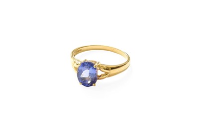 Lot 385 - An 18 Carat Gold Tanzanite Ring, the oval cut...