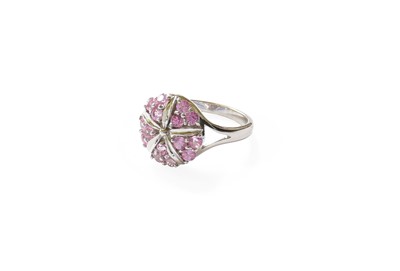 Lot 386 - An 18 Carat White Gold Pink Sapphire Cluster...