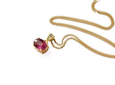 Lot 344 - An 18 Carat Gold Red Stone and Diamond Pendant...