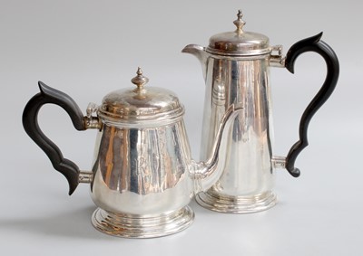 Lot 3 - A George V Silver Teapot and Hot-Water Jug, by...