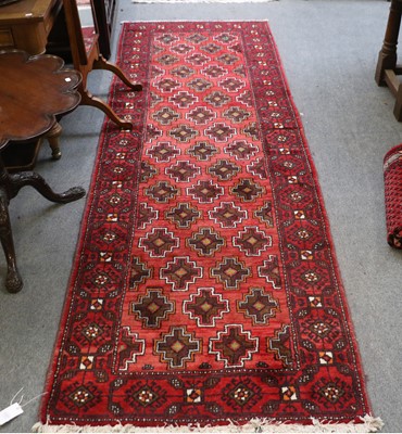 Lot 1181 - Baluch Rug, the strawberry field of stepped...