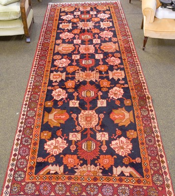 Lot 1129 - Kolyai Rug, the midnight blue field with...