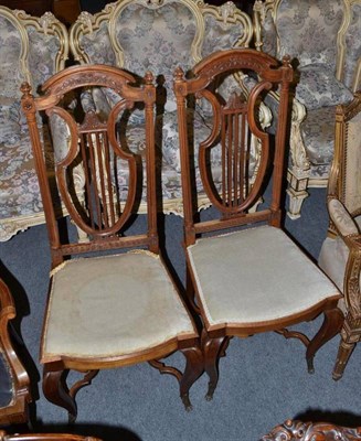 Lot 524 - A pair of walnut side chairs