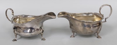 Lot 129 - A George V Silver Sauceboat and a George VI...