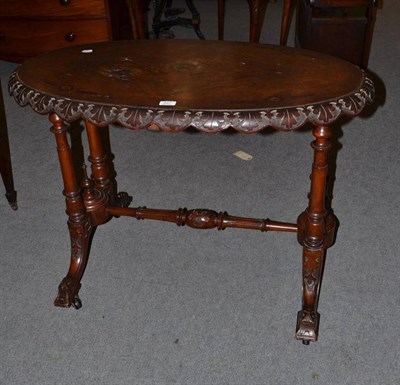 Lot 527 - Victorian inlaid oval table on stretched base