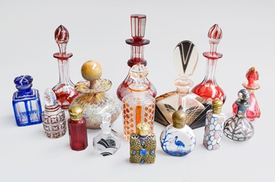 Lot 102 - A Collection of Glass Scent Bottles and...