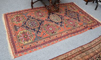 Lot 1161 - Caucasian Soumakh Carpet, the teracotta field...