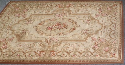 Lot 1200 - An Aubusson Design Rug, the cream field with...