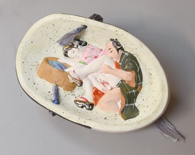 Lot 264 - A Japanese Ceramic Decorated Face Mask,...