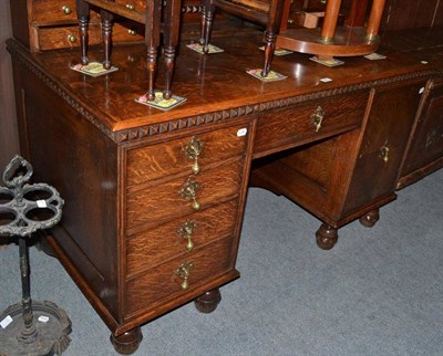 Lot 545 - Edwardian oak desk