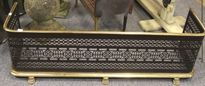 Lot 1372 - A 19th Century Pierced Brass Fire Curb, on paw...