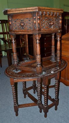 Lot 548 - A carved oak drop leaf occasional table and a carved oak side table with fold over top