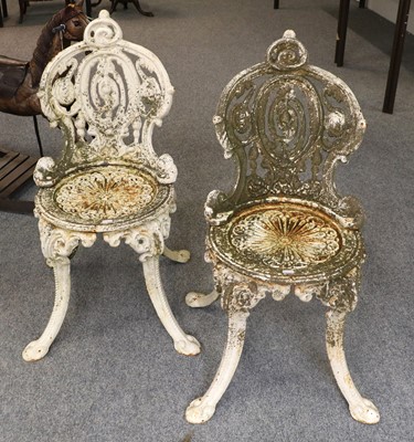 Lot 1377 - A Pair of Victorian Cast Iron Garden Chairs