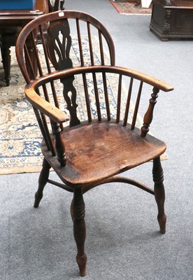 Lot 1429 - A 19th Century Elm Low Back Windsor Chair,...