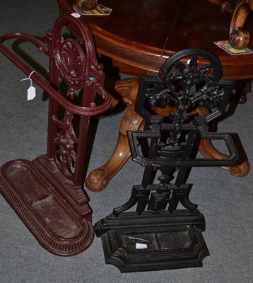 Lot 556 - A Victorian cast iron stick stand and a cast metal stick stand