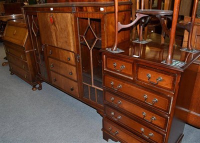 Lot 558 - A walnut glazed bookcase, a secretaire, a reproduction chest of drawers and an oak bureau