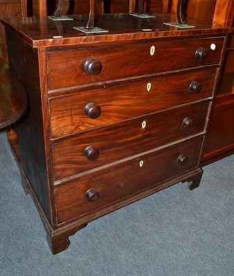 Lot 562 - A 19th century mahogany four height chest of drawers