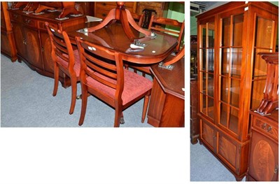 Lot 563 - A reproduction glazed bookcase; a reproduction mahogany dining room suite comprising table,...