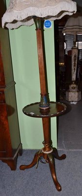 Lot 568 - A mahogany standard lamp with painted decoration