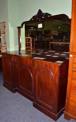 Lot 575 - A Victorian mahogany serpentine-shaped mirror back sideboard