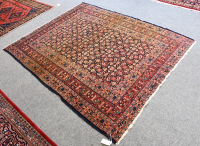 Lot 1083 - Senneh Rug, the deep indigo Herati field...