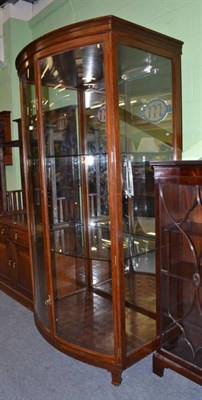 Lot 581 - A mahogany bow front display cabinet