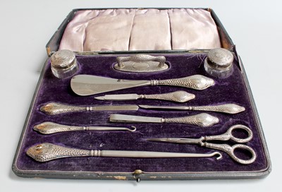 Lot 56 - A George V Cased Silver Manicure-Set, each...