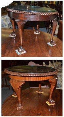 Lot 586 - Two mahogany glass topped coffee tables