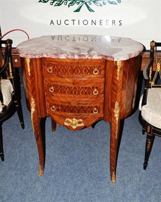 Lot 597 - A French walnut gilt metal mounted chest with marble top