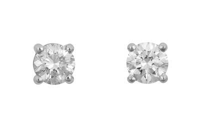 Lot 2313 - A Pair of Diamond Solitaire Earrings the round...