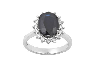 Lot 2301 - An 18 Carat White Gold Sapphire and Diamond...