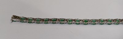 Lot 2227 - An Emerald and Diamond Bracelet the twenty-six...