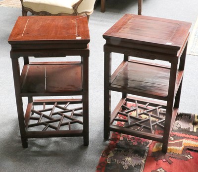 Lot 1421 - A Pair of Chinese Hardwood Two-Tier Lamp...