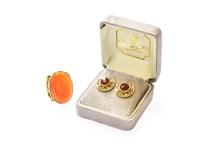 Lot 343 - A 9 Carat Gold Carnelian Ring, the oval cut...