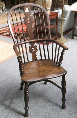 Lot 1431 - A 19th Century Elm Windsor Chair, with...