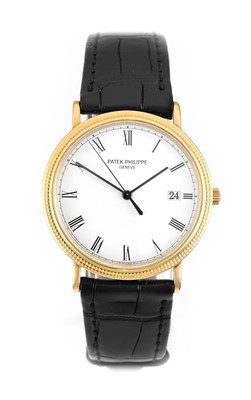 Lot 2130 - Patek Philippe: An 18 Carat Gold Calendar...