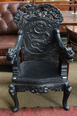 Lot 1273 - A Modern Carved Chinese Chair, decorated with...