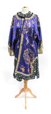 Lot 2100 - An Early 20th Century Chinese Robe in Purple...