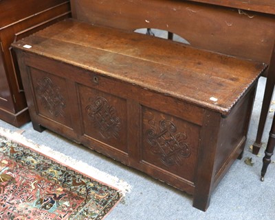 Lot 1447 - An 18th Century Carved Oak Three Panel Coffer,...