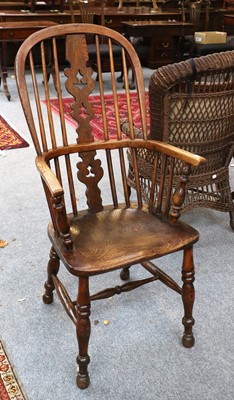 Lot 1291 - A 19th Century Elm Windsor Chair