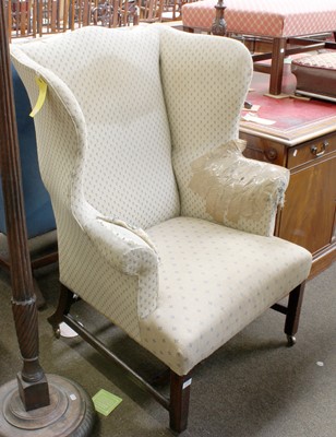 Lot 1232 - A George III Style Wing Back Armchair