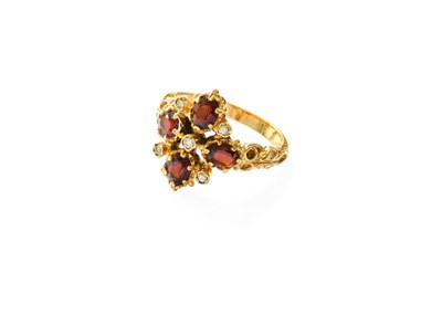 Lot 377 - An 18 Carat Gold Garnet and Diamond Ring, a...