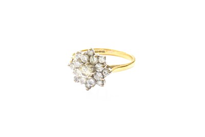 Lot 347 - An 18 Carat Gold Diamond Cluster Ring, the...