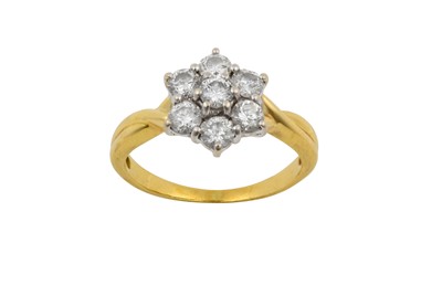 Lot 2277 - A Diamond Cluster Ring the central raised...