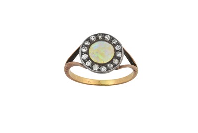 Lot 2346 - An Opal and Diamond Cluster Ring the round...