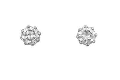 Lot 2344 - A Pair of Diamond Solitaire Earrings the round...